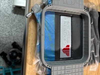 Commercial embroidery hoop setup for precise garment stitching in Austin TX