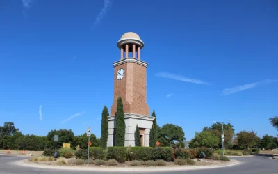 Cedar Park clock tower landmark representing custom t-shirts and apparel in Cedar Park TX